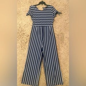 Girls large romper. Navy blue.